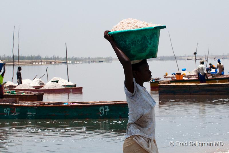 20090529_142022 D300 P1 S1.jpg - Lady carrying basin of salt, Pink Lake